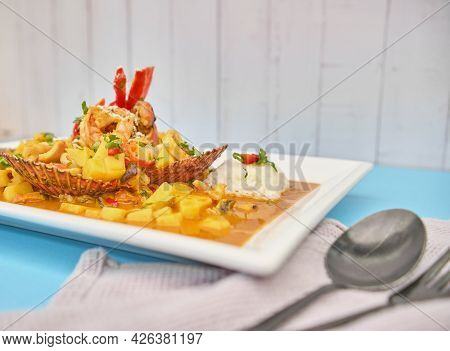 Peruvian Food: Picante De Mariscos With Rice, Sea Food.