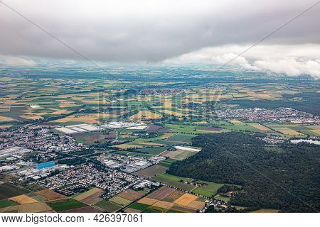 Aerial Of Gross Gerau In Hesse With Agricultural And Industry Production With Cloudy Sky