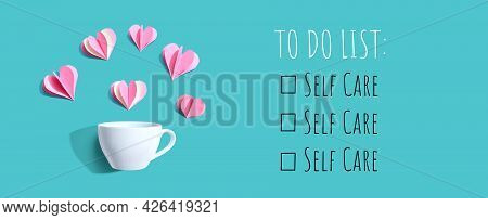 Self Care - To Do List With A Coffee Cup And Paper Hearts - Flat Lay