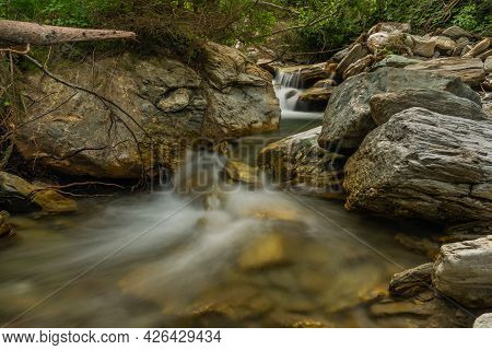 Nice Color Clean Creek Near Huttschag Village In Summer Hot Day