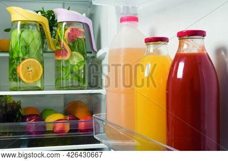 In Refrigerators Bottled Juice And Lemonade From Fresh Fruit In Decanters, Storage Of Drinks In Refr