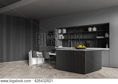 Corner Of The Kitchen Room With Robust Table And Four Chairs. Cabinet With Square Niche And Open She