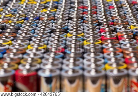 Multiple Stacked Aaa Batteries Of Different Color And Manufacturer