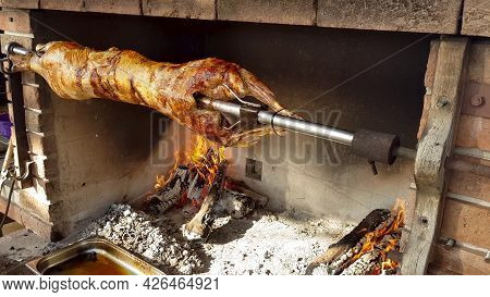 Spit Roasted Lambs, Traditional Way Of Roasting Lambs On A Rotisserie Spit In Bulgaria. Cheverme..