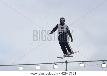 BUKOVEL, UKRAINE - FEBRUARY 23: Allison Lee, USA performs aerial skiing during Freestyle Ski World Cup in Bukovel, Ukraine on February 23, 2013