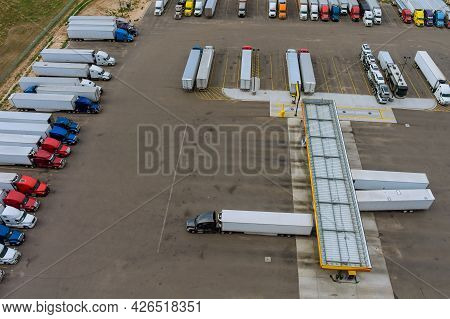 Resting Place The Truck Stop Various Types Of Trucks In Parking Lot The Highway With Gas Station For