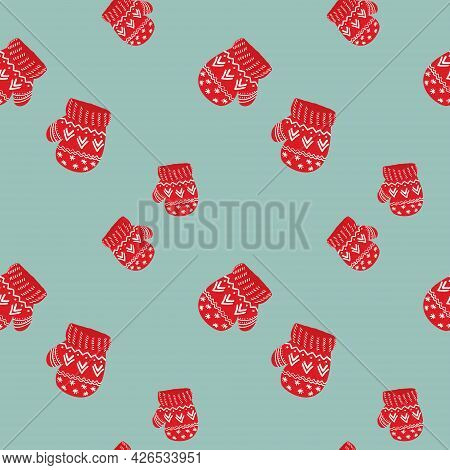 Christmas Pattern Red Mittens On Blue Background