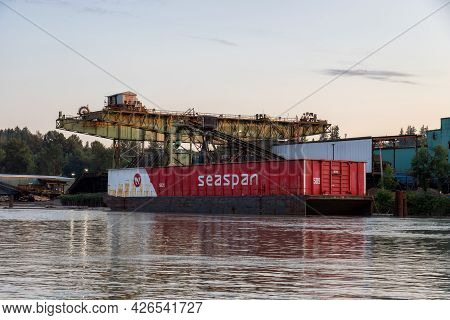 Surrey, Greater Vancouver, British Columbia, Canada - July 7, 2021: Container Barge Loaded At A Mill