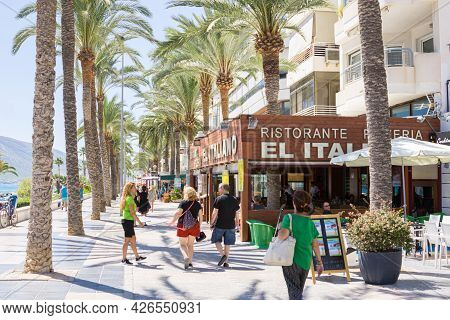 Calpe Spain- August 24 2016; Typically Mediterranean Street In Tourist Coastal Town People Waliking 