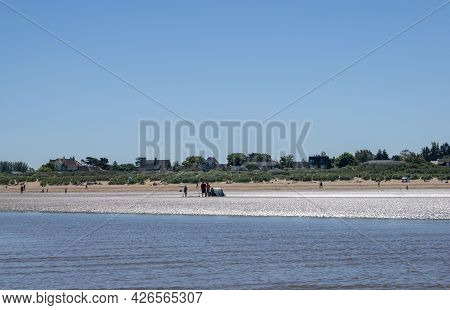 Old Hunstanton, Norfolk, England - June 13 2021. Old Hunstanton Beach On A Sunny Day With A View Fro