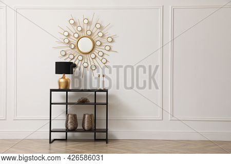 Console Table Near White Wall With Mirror In Hallway, Space For Text. Interior Design
