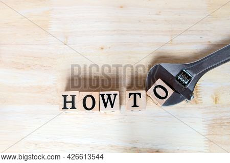 How To Concept Idea, Wooden Letters For Build Message With Wrench On Wooden Desk, Informative And Co