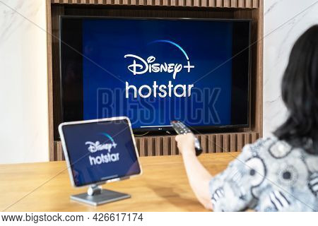 Bangkok, Thailand - July 13, 2021: Disney+ Hotstar Movie App Logo On Ipad And Smart Tv Television Sc