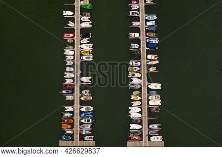 Aerial View Of A The Jetty Of A Sailing Club In Helford, Cornwall Full Of Small Boats