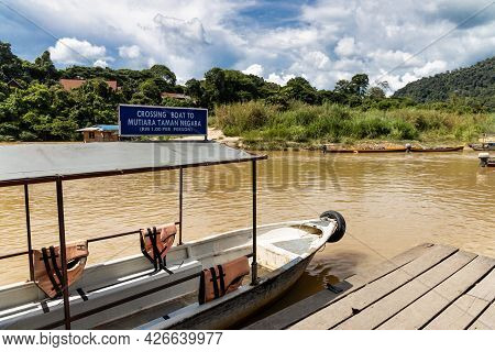 Kuala Tembeling, Malaysia, July12, 2021: Boats Waiting At Kuala Tembeling Jetty To Ferry Tourist Acr