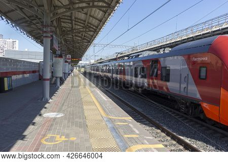Russia, Moscow,  July, 13, 2021: Moscow Central Ring. Lastochka Electric Train  At The Shelepikha St