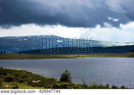 Lake Uzunkel Is Surrounded By Mountains And The Siberian Taiga. Ulagansky District, Altai Republic, 