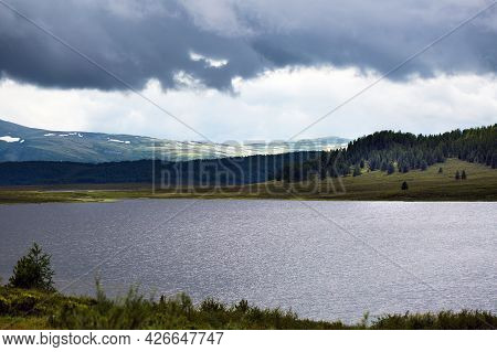 Lake Uzunkel Is Surrounded By Mountains And The Siberian Taiga. Ulagansky District, Altai Republic, 