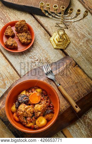 Jewish Dish Shut With Meat On A Wooden Table Near Matzo And Ingredients. Vertical Photo