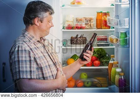 The Mature Men At Fridge  With Beer