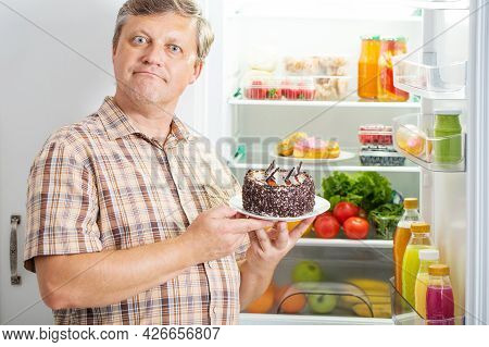 The Mature Men At Fridge  With Food