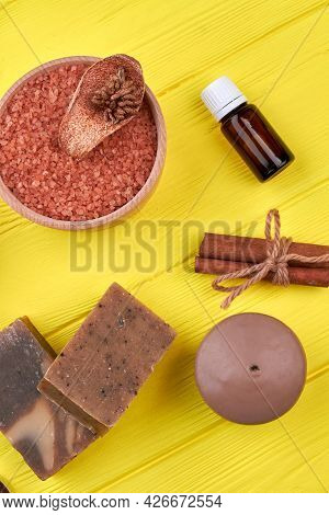 Handmade Soap Pieces With Cinammon And Candle Top View.