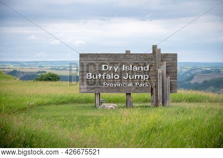 Huxley, Alberta - July 4, 2021: Sign At The Entrance To Dry Island Buffalo Jump Provincial Park Near