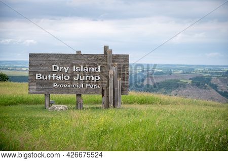 Huxley, Alberta - July 4, 2021: Sign At The Entrance To Dry Island Buffalo Jump Provincial Park Near