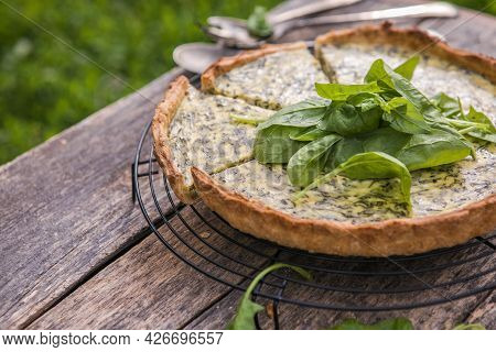 Quiche With Spinach - Traditional Dish Of French Cuisine. Spinach  Tart