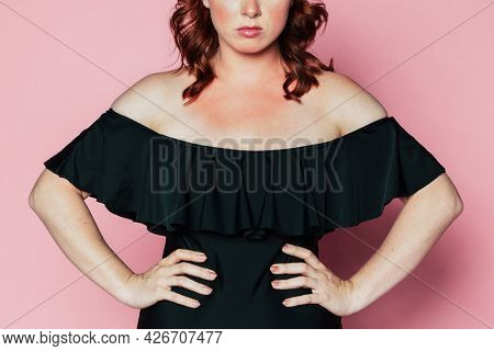 Skeptical woman with sunburnt skin