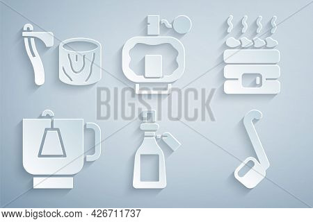 Set Essential Oil Bottle, Hot Sauna Stones, Cup Of Tea With Tea Bag, Sauna Ladle, Aftershave And Woo
