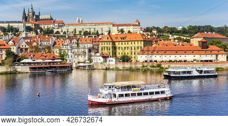 Prague, Czech Republic - September 13, 2020: Tourist Cruise Boat On The River Moldau In Historic Cit