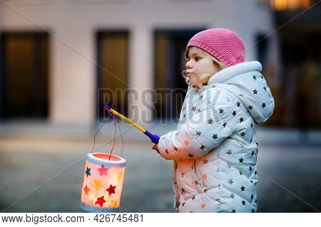 Little Kid Girl Holding Selfmade Lanterns With Candle For St. Martin Procession. Healthy Cute Toddle