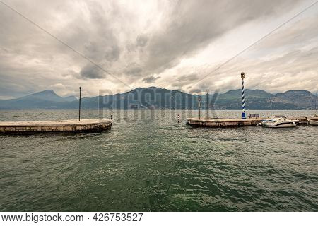 Lago Di Garda. The Lake Garda View From The Port Of The Small Village Of Castelletto Di Brenzone, Br