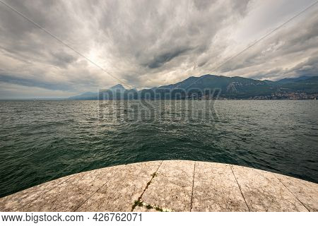 Lago Di Garda. The Lake Garda View From The Port Of The Small Village Of Castelletto Di Brenzone, Br