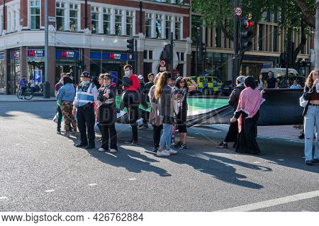 London - May 29, 2021: Protesters At A Freedom For Palestine Protest Rally Outside Holborn Tube Stat