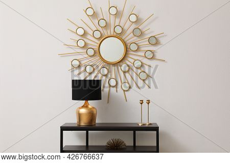 Console Table Near White Wall With Mirror In Hallway. Interior Design