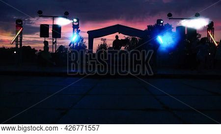 Ukraine - 06.21.21: Children Dance And Have Fun In The Evening To Music At The Disco In The Light Of