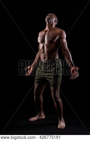 African American Man With Hands Open And Head Bent Backwards