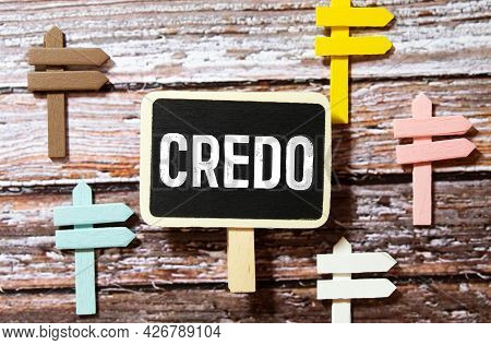 Credo - Word On A Green Background With A Black Handle. Info Concept.