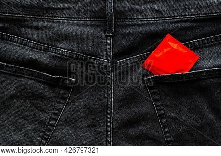 Condom In Back Side Of Jeans Pocket For Anal Safe Sex, World Sexual Health And Aids Day Concept.