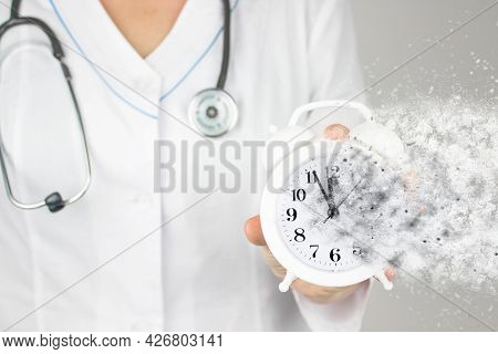 Time Is Crucial Life Saver. Concept Healthcare. Doctor In White Coat With Stethoscope Pointing And D
