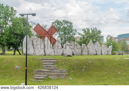 Lubin, Poland - June 1, 2021: Cross At Monument To The Memory Of The Victims Of Lubin 1982 At Cloudy