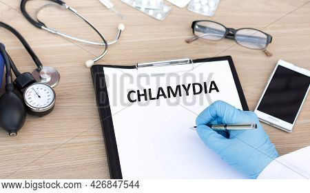 Paper With Text Chlamydia And Doctor Hand, Medical Concept