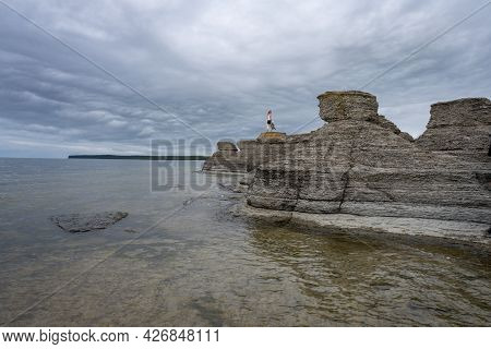June 6, 2021 - Borgholm, Sweden: People Enjoy Beautiful Limestone Formations With A Dramatic Sky In 
