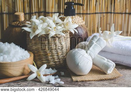 Closed Up Harbal Massage Compress With Spa Salt, Fragrance Flower, Soft White Towel, And Aroma Gel I