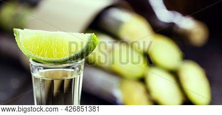 Glass Of Alcoholic Drink With Lemon, Distilled From Sugar Cane, Called In Brazil 