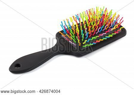 New Rainbow Colorful Pastic Hair Brush Isolated On White Background.