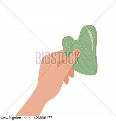 Gua Sha Jade Scraping Massage Tool In Hand. Natural Green Stone Scraper. Facial Massage. Face Liftin