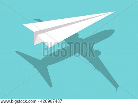 White Paper Airplane On Light Blue Background With Real Plane Shadow : Dream Or Self Confidence Conc
